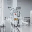 The Role of Robotics and Automation in Transforming the Manufacturing Sector and Driving the Adoption of Industry 4.0